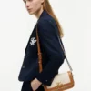 Bolsa a tiracolo em lona com monograma Script Bolsa a tiracolo em lona com monograma Script