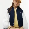 Boné de basebol infantil com logótipo Tommy em letras cursivas