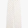Calças de dormir em jersey com estampado floral Calças de dormir em jersey com estampado floral