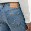 Calças de Jeans largas com efeito desgastado