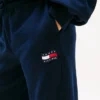 Calças de treino com logótipo de bandeira ondulada para criança Calças de treino com logótipo de bandeira ondulada para criança