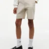 Calções chino largos elásticos com cinto para criança Calções chino largos elásticos com cinto para criança