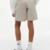 Calções chino largos elásticos com cinto para criança Calções chino largos elásticos com cinto para criança