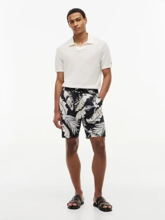 Calções com corte regular de 18 cm com estampado tropical