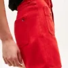 Calções de ganga com bolso com botão dourado Calções de ganga com bolso com botão dourado
