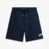 Calções de moletom de perna larga com logótipo Hilfiger para criança Calções de moletom de perna larga com logótipo Hilfiger para criança