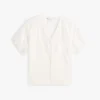 Camisa com decote em V e ilhós bordados