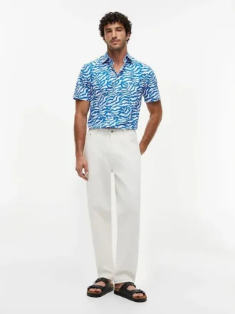 Camisa com estampado de folhas de palmeira e toque de papel