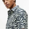 Camisa com estampado de folhas de palmeira e toque de papel Camisa com estampado de folhas de palmeira e toque de papel