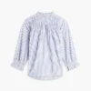 Camisa de voile com pregas e acabamento com folhos Camisa de voile com pregas e acabamento com folhos
