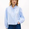 Camisa Oxford curta com acabamento em folhos Camisa Oxford curta com acabamento em folhos