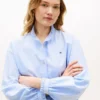 Camisa Oxford curta com acabamento em folhos Camisa Oxford curta com acabamento em folhos