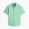 Camisa Oxford tingida na peça, corte regular Camisa Oxford tingida na peça, corte regular