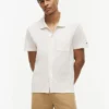 Camisa polo com bolso em malha e corte regular Camisa polo com bolso em malha e corte regular