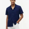 Camisa polo com bolso em malha e corte regular Camisa polo com bolso em malha e corte regular