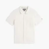 Camisa polo com bolso em malha e corte regular Camisa polo com bolso em malha e corte regular