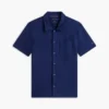 Camisa polo com bolso em malha e corte regular Camisa polo com bolso em malha e corte regular
