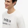 Camiseta com logotipo multiflagas Hilfiger Camiseta com logotipo multiflagas Hilfiger