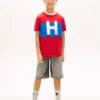 Camiseta infantil com logotipo náutico em blocos de cor Camiseta infantil com logotipo náutico em blocos de cor
