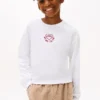 Camiseta infantil com logótipo bordado em forma de coração Camiseta infantil com logótipo bordado em forma de coração