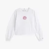 Camiseta infantil com logótipo bordado em forma de coração Camiseta infantil com logótipo bordado em forma de coração
