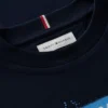 Camiseta infantil Tommy com logotipo grafitado Camiseta infantil Tommy com logotipo grafitado