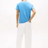 Camiseta Tommy Jeans com logotipo de bandeira ondulada Camiseta Tommy Jeans com logotipo de bandeira ondulada