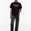Camiseta Tommy Jeans com logotipo em degradê Camiseta Tommy Jeans com logotipo em degradê