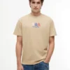 Camiseta Tommy Jeans com logotipo Multi-Crest Camiseta Tommy Jeans com logotipo Multi-Crest