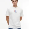 Camiseta Tommy Jeans com logotipo Multi-Crest Camiseta Tommy Jeans com logotipo Multi-Crest