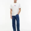 Camiseta Tommy Jeans com logotipo Multi-Crest Camiseta Tommy Jeans com logotipo Multi-Crest