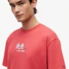 Camiseta Tommy Jeans com logotipo Multi-Crest Camiseta Tommy Jeans com logotipo Multi-Crest