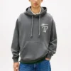 Camisola com capuz Tommy Jeans com logótipo pintado com spray Camisola com capuz Tommy Jeans com logótipo pintado com spray