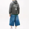 Camisola com capuz Tommy Jeans com logótipo pintado com spray Camisola com capuz Tommy Jeans com logótipo pintado com spray