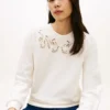 Camisola com ilhós bordados