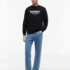 Camisola com logótipo Tommy Jeans em camurça Camisola com logótipo Tommy Jeans em camurça