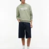 Camisola com logótipo Tommy Jeans em camurça Camisola com logótipo Tommy Jeans em camurça