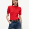 Camisola de malha com tranças de manga curta Camisola de malha com tranças de manga curta