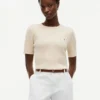 Camisola de malha com tranças de manga curta Camisola de malha com tranças de manga curta