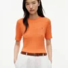 Camisola de malha com tranças de manga curta Camisola de malha com tranças de manga curta