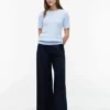 Camisola de malha com tranças de manga curta Camisola de malha com tranças de manga curta