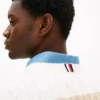Camisola de malha com tranças e riscas Camisola de malha com tranças e riscas