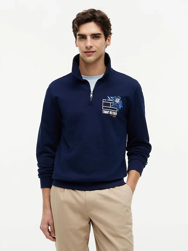 Camisola polo com fecho de correr de um quarto e logótipo floral Camisola polo com fecho de correr de um quarto e logótipo floral