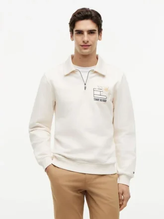 Camisola polo com fecho de correr de um quarto e logótipo floral