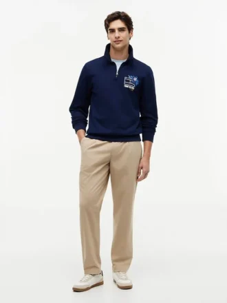 Camisola polo com fecho de correr de um quarto e logótipo floral