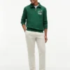 Camisola polo com fecho de correr de um quarto e logótipo floral Camisola polo com fecho de correr de um quarto e logótipo floral