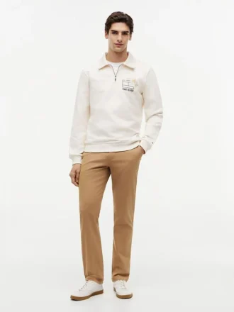 Camisola polo com fecho de correr de um quarto e logótipo floral