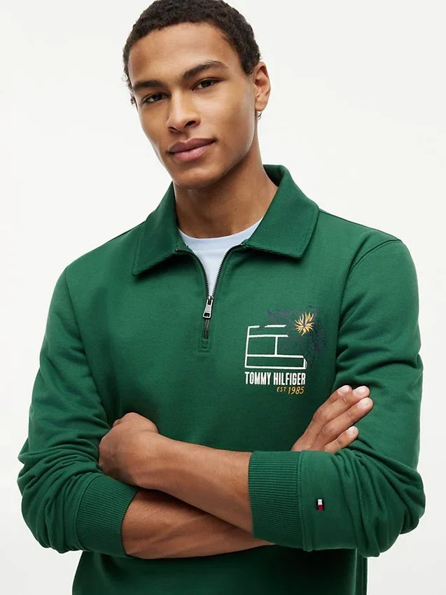 Camisola polo com fecho de correr de um quarto e logótipo floral Camisola polo com fecho de correr de um quarto e logótipo floral