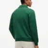 Camisola polo com fecho de correr de um quarto e logótipo floral Camisola polo com fecho de correr de um quarto e logótipo floral