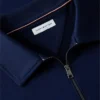 Camisola polo com fecho de correr de um quarto e logótipo floral Camisola polo com fecho de correr de um quarto e logótipo floral